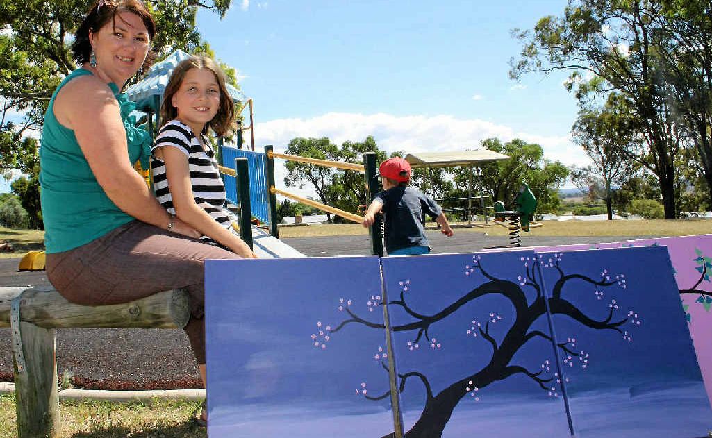 Greymare mum-of-four and artist Megan Benz with daughter Alyssa, 10. Greymare mum-of-four and artist Megan Benz with daughter Alyssa, 10.